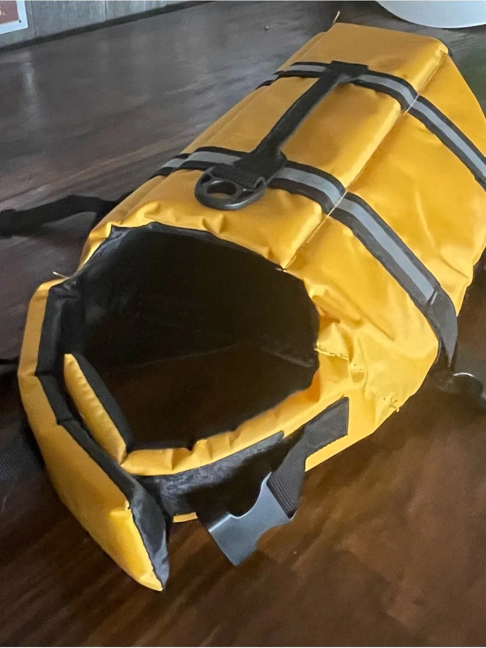 Yellow floatation device for dog